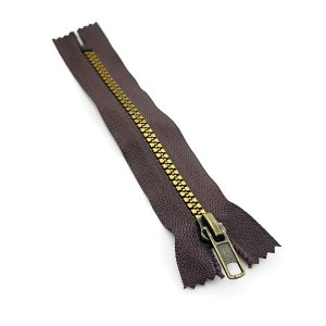 Cierre Resina #5 café/diente oro viejo 15 cm.